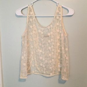 Beautiful sheer top with flower/vine design